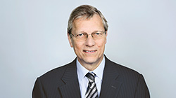 John R. Coomber – Member, non-executive and independent (photo)